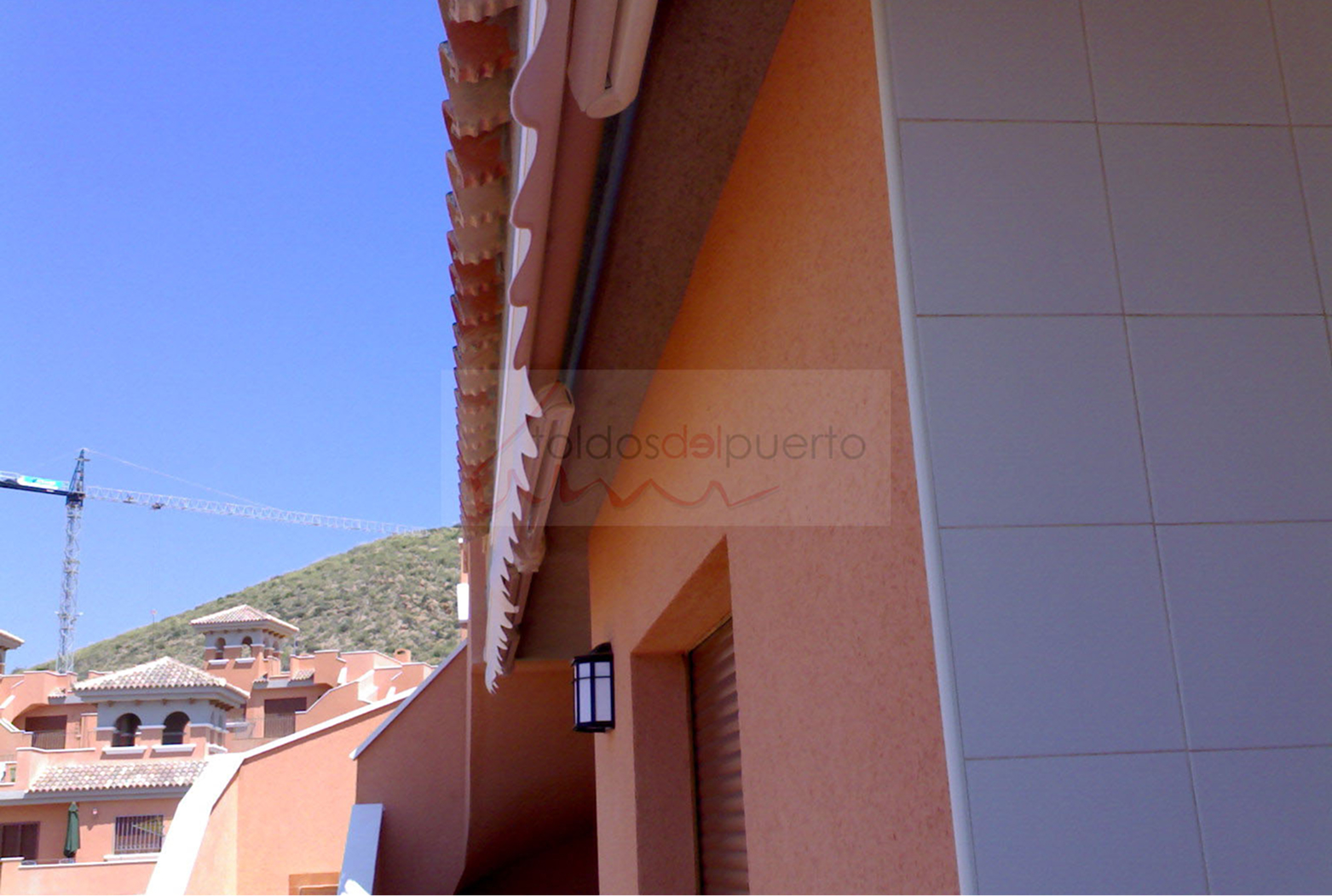 Toldo brazo extensible Mojon Hill