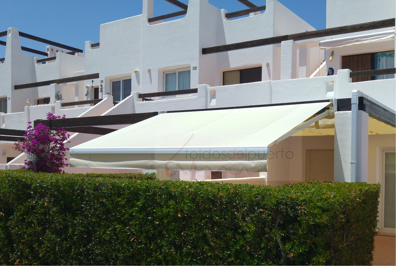 Toldo brazo extensible Condado de Alhama